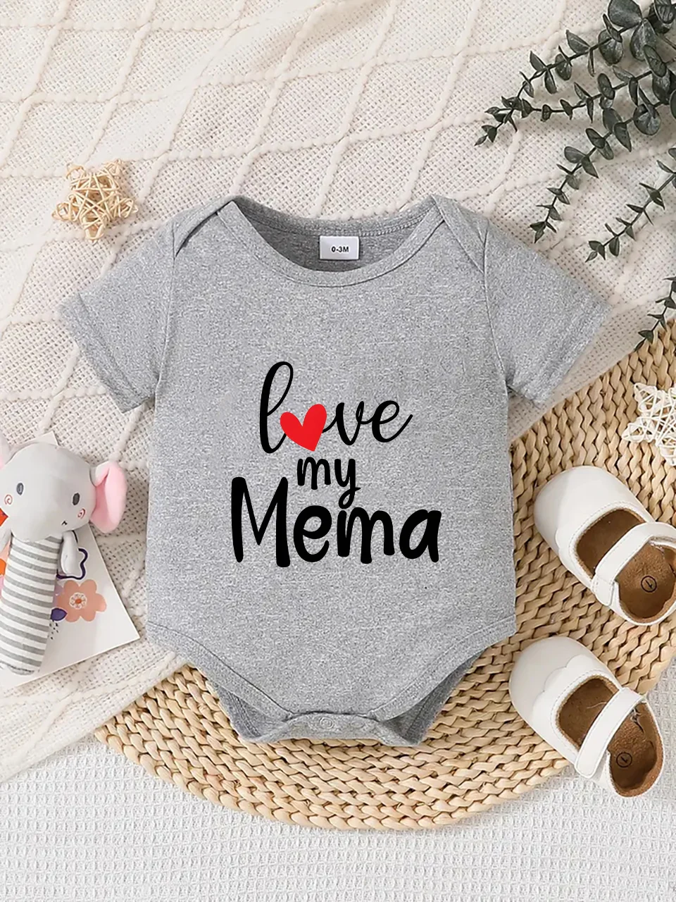 Playful letter-printed baby short-sleeve triangle bodysuit. Button closure for easy dressing, machine washable