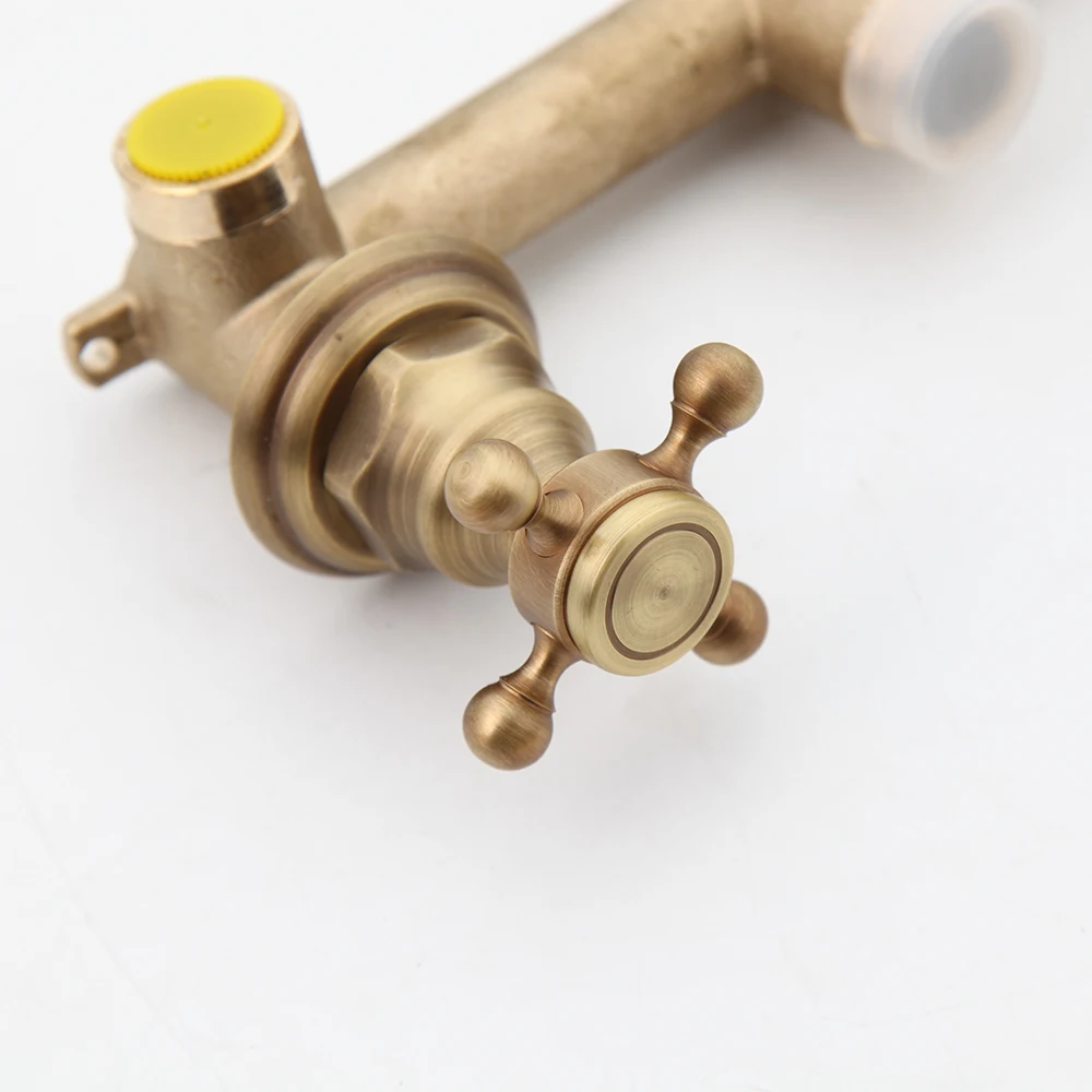 KEMAIDI Bathroom Faucet Antique Brass Wall Mounted Bathroom Sink Faucet 360 Swivel Spout 2 Cross Knobs Handles Basin Faucet Tap