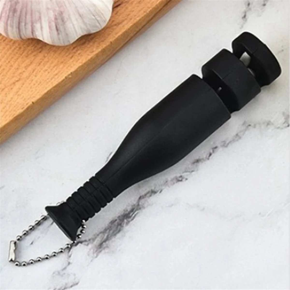 ที่ลับมีดแบบพกพาขนาดเล็กลับคมมีดสนับสนุนครัวผลไม้ในครัวเรือนมีดเหลาหินครัว