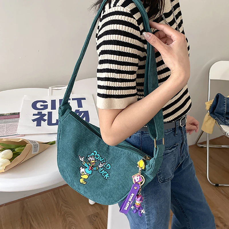 MINISO Cartoon Mickey Donald Duck Bag Retro Corduroy Crossbody Bag Single Shoulder Bag Underarm Bag (excluding pendants)