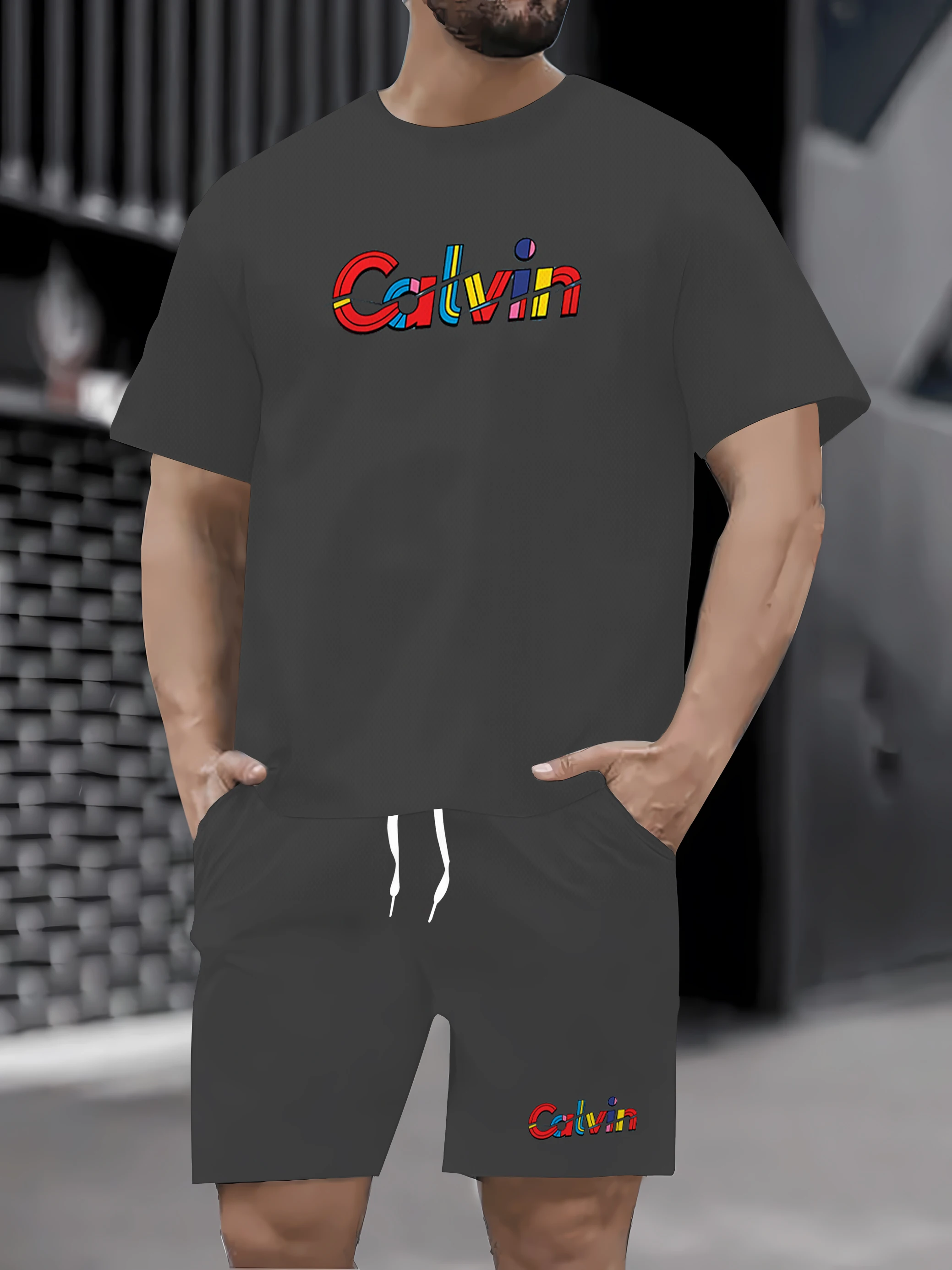 Conjunto masculino solto e moderno de dva parts: camiseta e shorts de verão de manga curta، secagem cepat e respirable