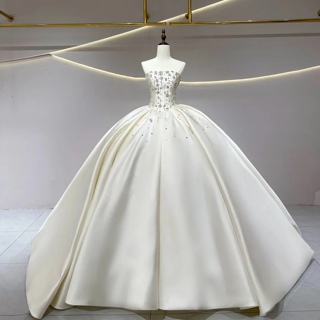 ชุดแต่งงานบอลกาวน์ผ้าซาตินสุดหรู แบบไร้สาย ประดับลูกปัด สไตล์เจ้าหญิง  สามารถสั่งตัดได้  ชุดเจ้าสาวแบบผูกเชือกด้านหลัง