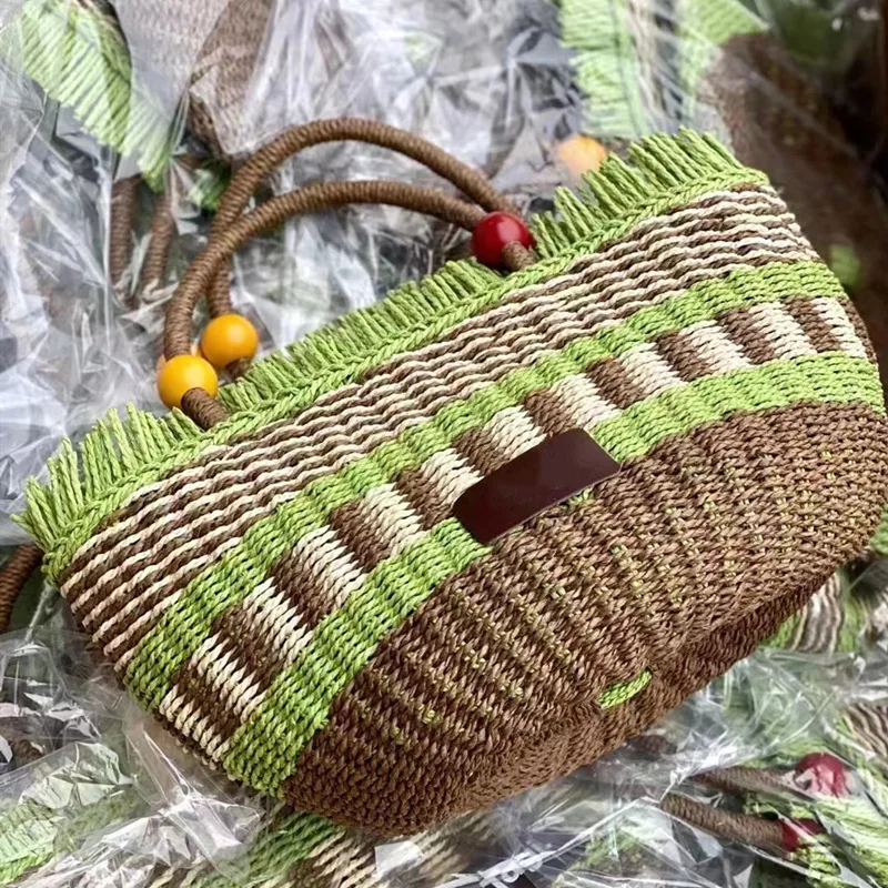 

Cute Bucket Bag Tassel Bead Decorated Woven Straw Handbag Gift Picnic Basket Soft Medium Size Polyester Lined Women's Handbag