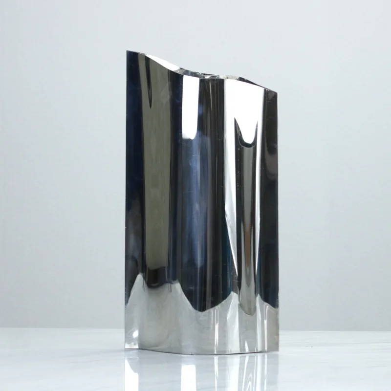 Simple and modern flat stainless steel flower ware, leather metal vase, light luxury desktop ornament, living room wine cabinet