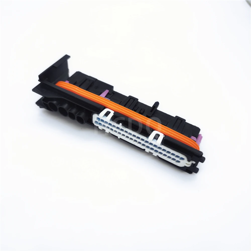 The original 1928404563 automotive connector plug housing and connector are supplied from inventory.