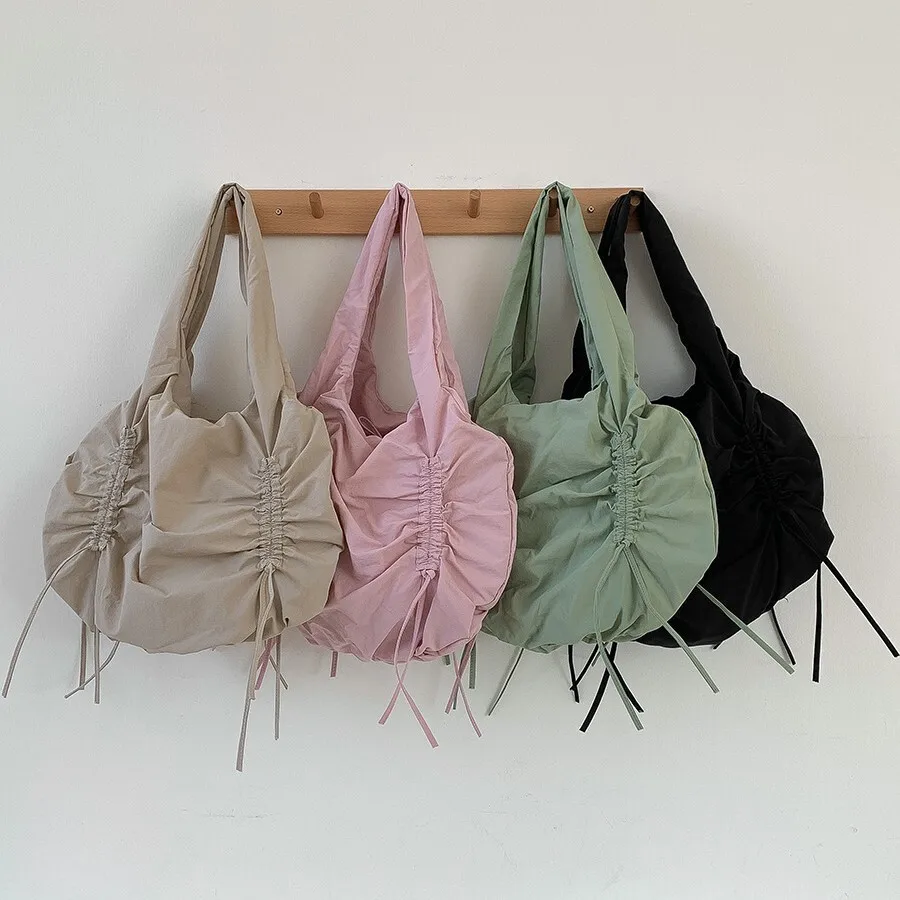 

2025 Y2K Style Pleated Niche Lightweight Large Capacity Nylon Bag Women's Drawstring Personalized Street Single Shoulder Bag