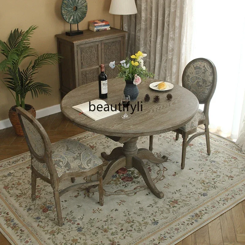 New style  American all solid wood round dining table, a set of retractable retro oak dining table and chairs for home use