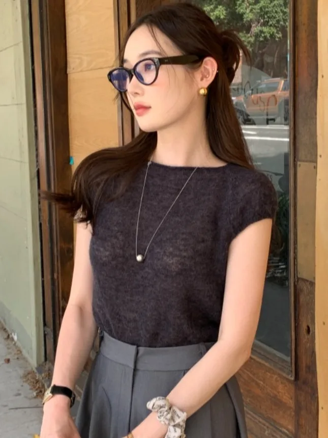 シックな夏ルーズニット半袖ラウンドネックプルオーバー無地 Tシャツ女性のファッショナブルな多用途カフストップ