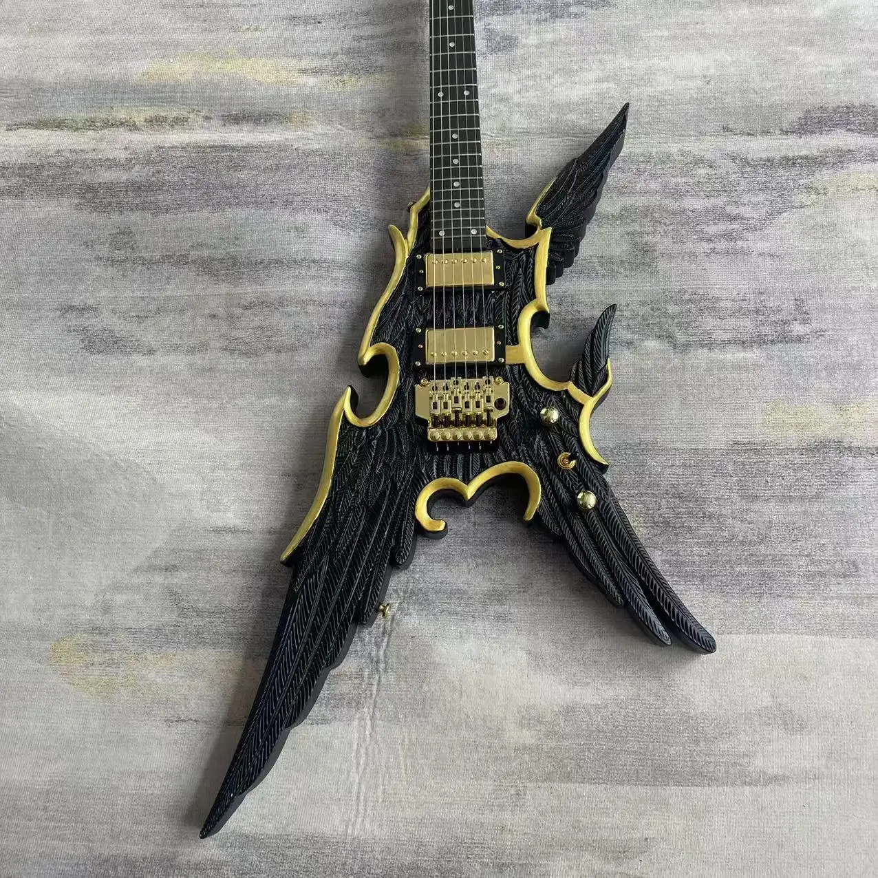 Carved Freedom Wings 6-chord electric guitar, black hand-painted body, real shipping picture, in stock