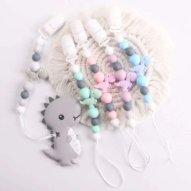 4 stücke/5 stück Baby Dinosaurier Silikon Anhänger Schnuller Clips Ketten Halter Beißring Baby Kawaii Spielzeug Geschenk
