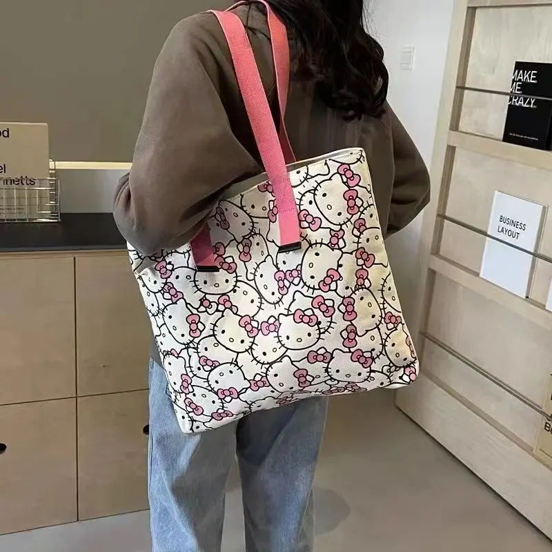 New  Hello Kitty Shoulder Bag Anime Canvas Printed Handbag Commuter Versatile Water Cup Storage Bag Cute Bento Tote Bag