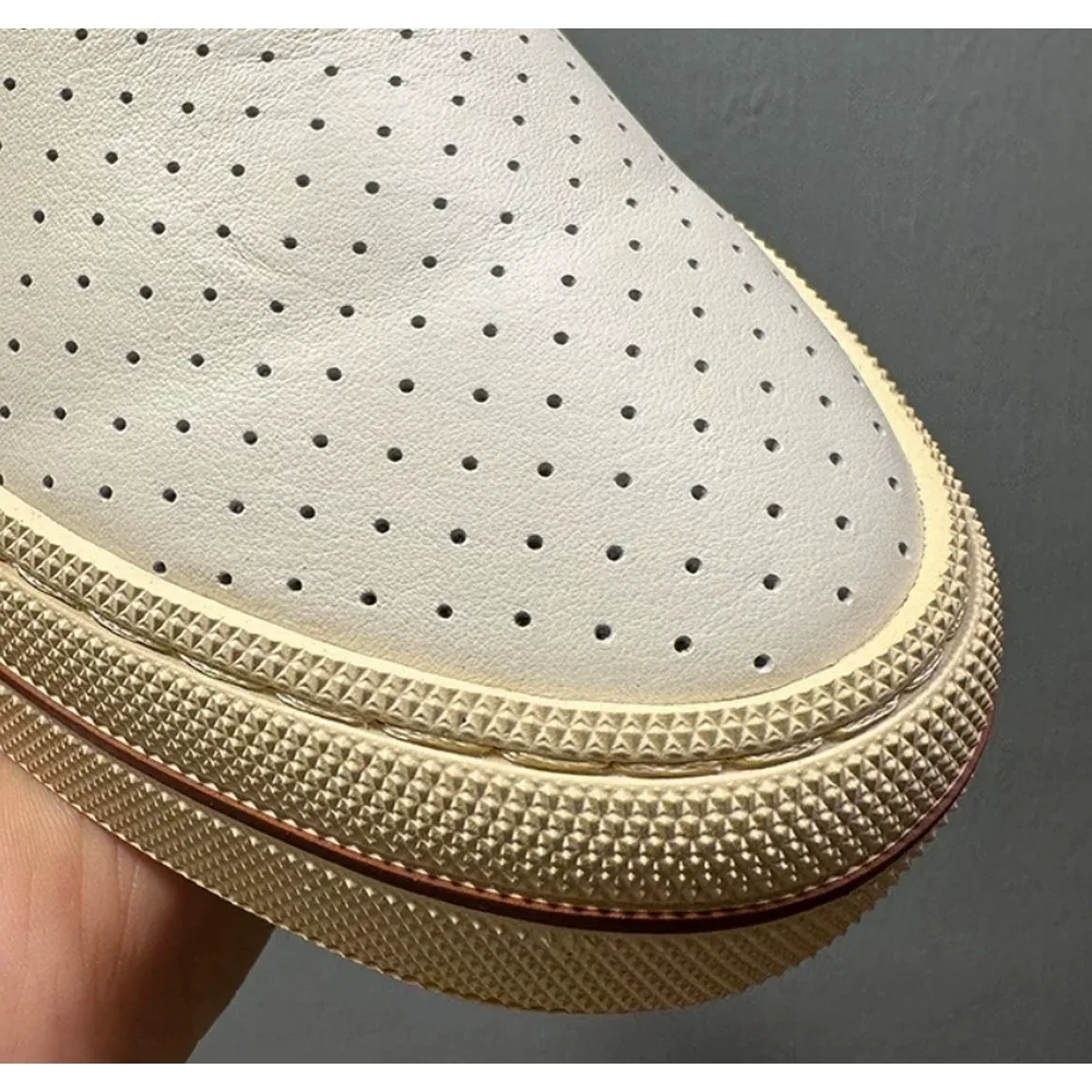 White-painted perforated leather ankle-high casual shoes with retro rubber sole - suitable for daily commuting.