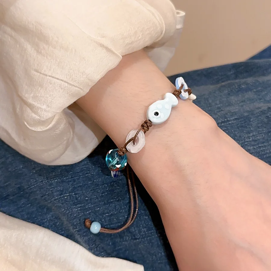 Keramik-Fisch-Stern-Armbänder mit geflochtenem Seil für Frauen, niedliche blaue kleine Knopf-Armbänder, romantischer verstellbarer Schmuckzubehör. – Detail 4