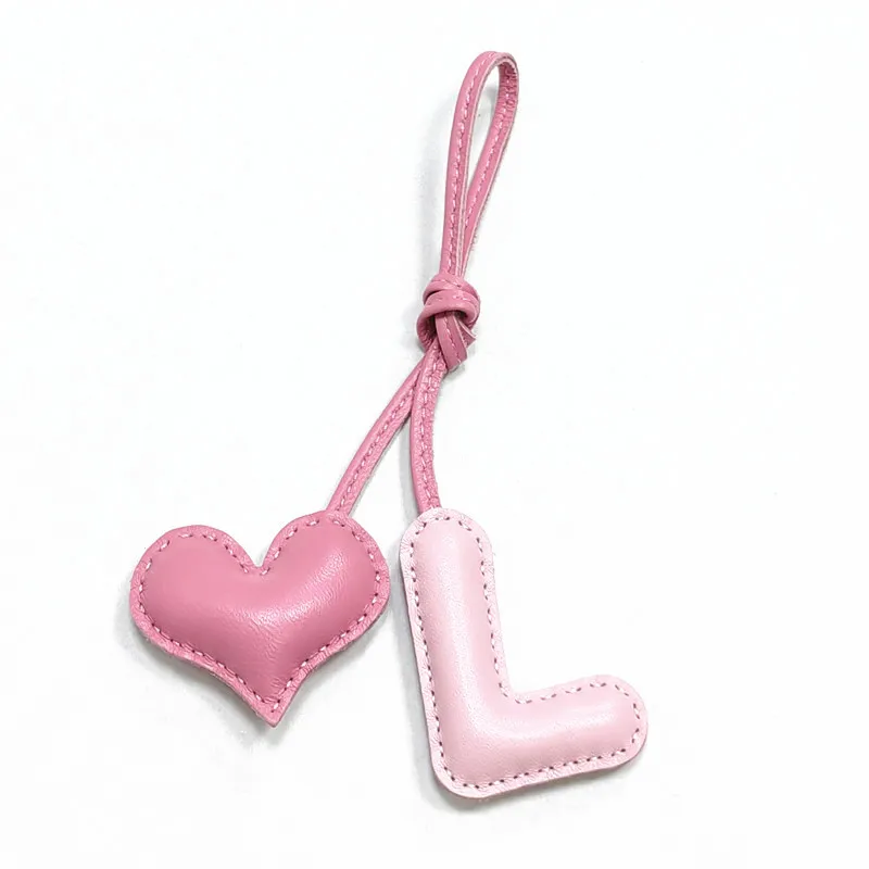 

Genuine leather L with heart-shaped letter style bag decoration with pure handmade stitching, high-end car keychain accessories