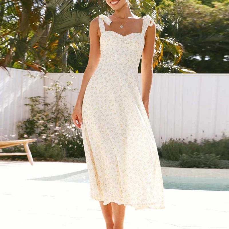 เดรสยาวพิมพ์ลายดอกไม้แฟชั่น เอวสูง สไตล์ลำลองสำหรับผู้หญิง เปิดไหล่ จับจีบ เหมาะสำหรับใส่ไปเที่ยวทะเล เซ็กซี่ แขนกุด สายเดี่ยว สำหรับวันหยุด