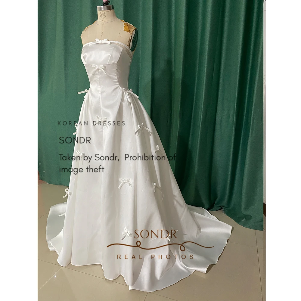 Eleganckie suknie ślubne koreańskie bez ramiączek Sondr, z kokardą, z jedwabnej satyny, gorsetowe, szyte na miarę suknie wieczorowe na przyjęcie.