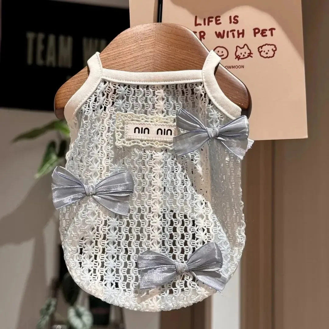 

New Bow Pet Vest Hollow Lace Dog Sling Pet Summer Breathable Clothes Teddy Solid Color Pullover Pet Supplies