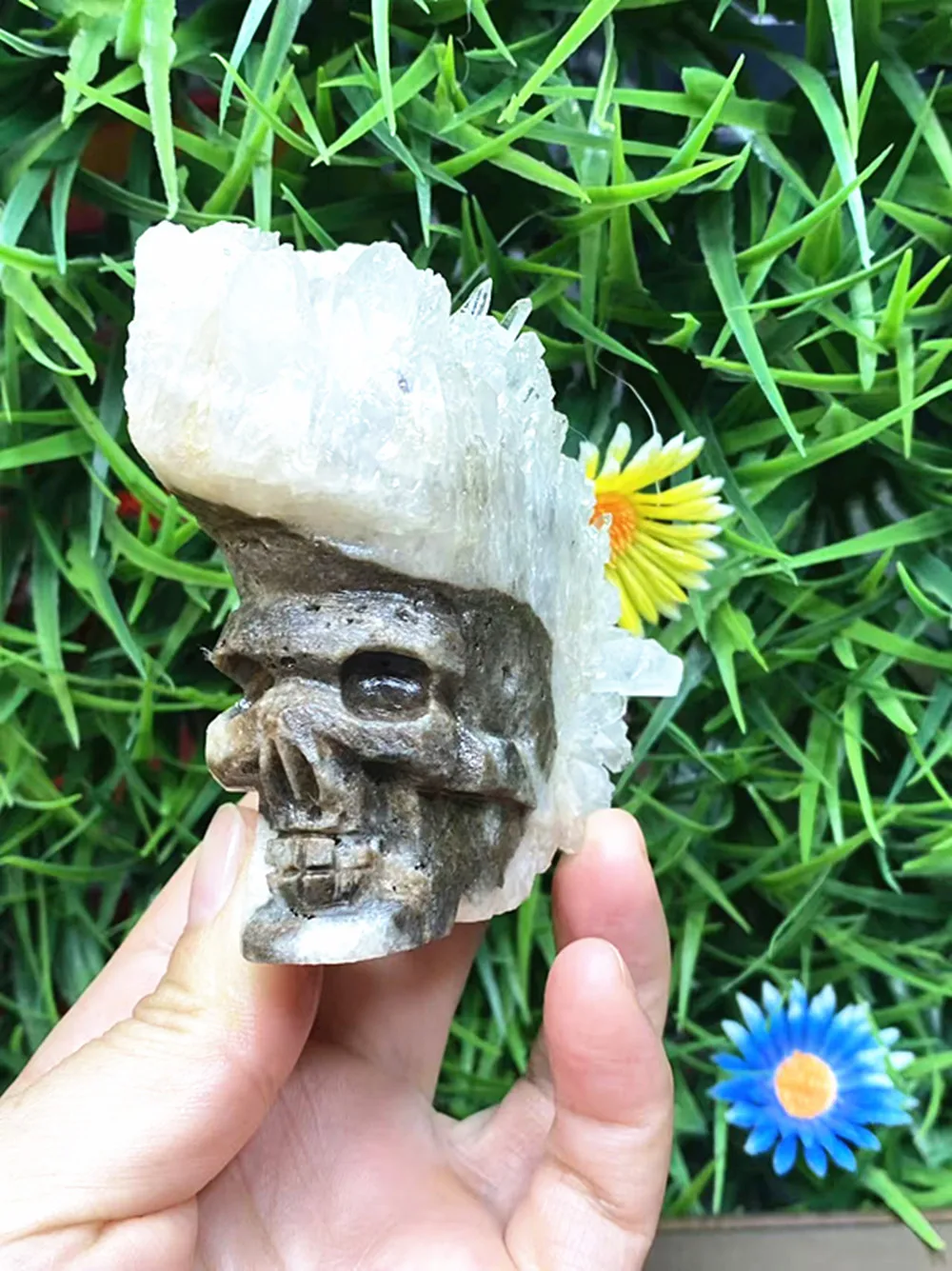 Natural quartz crystal white crystal cluster carved with a skull. Home decoration. Ornament. Gift for others.