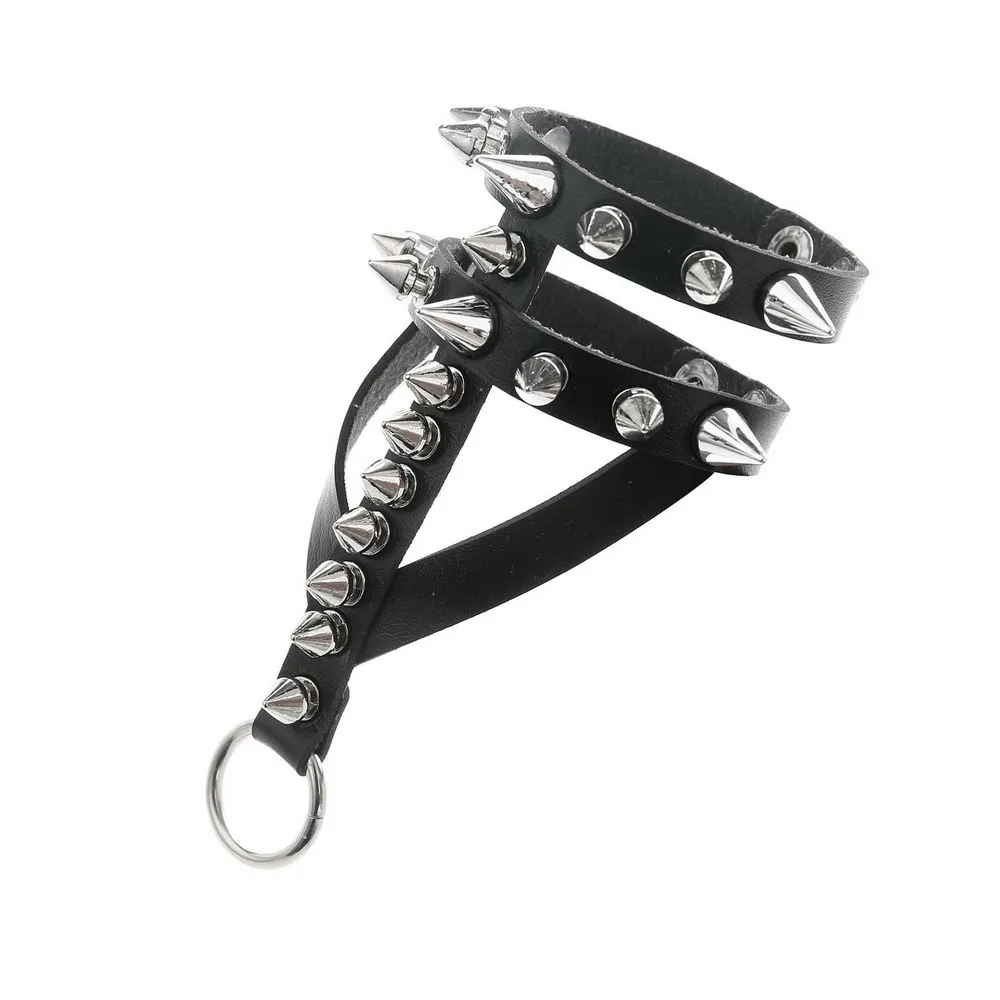 Gothic punk style bracelet with long and short spikes, wristband and ring in one piece