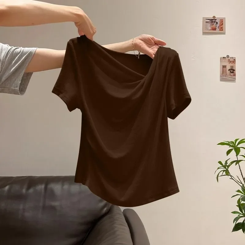 Damska bluzka z odkrytymi ramionami, asymetryczna, dopasowana, z nieregularnymi krótkimi rękawami, nowość na wiosnę i lato 2026, minimalistyczna, uniwersalna bluzka typu pulower.
