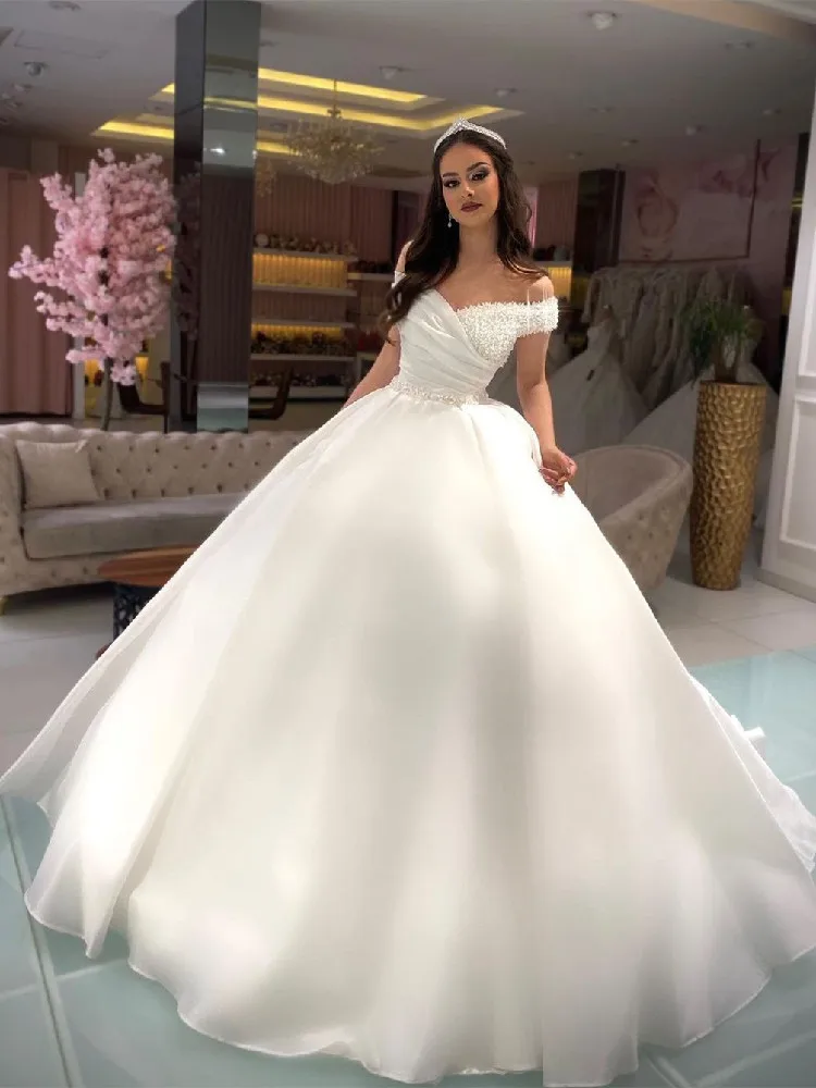 

Elegant Ball Gown Wedding Dresses Sleeveless V Neck Pearls Sequins Appliques Beaded Off Shoulder Bridal Gowns Vestina De Novia