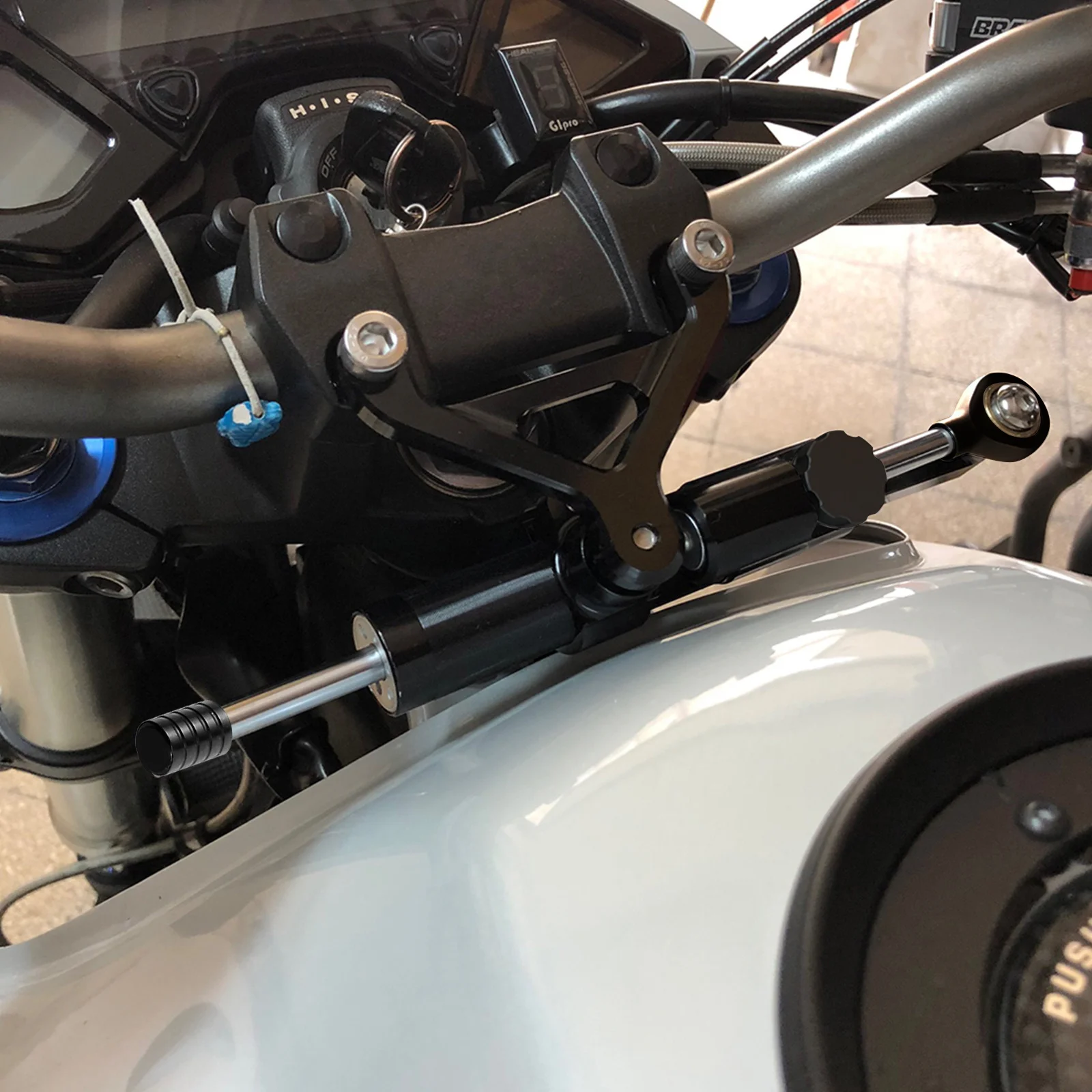 Amortisseur de stabilisateur de direction universel pour moto, en alliage d'aluminium, système d'amortissement sensible à la vitesse, installation facile, antirouille, léger