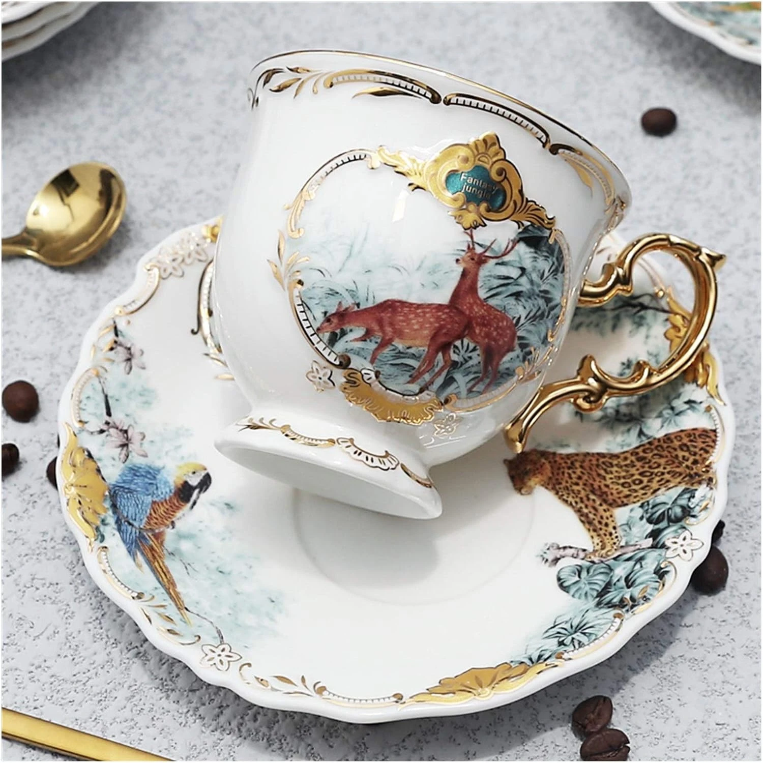 merse you in luxury. Enjoy sipping your favorite brew in this exquisite handcrafted porcelain tea cup and saucer set, featuring