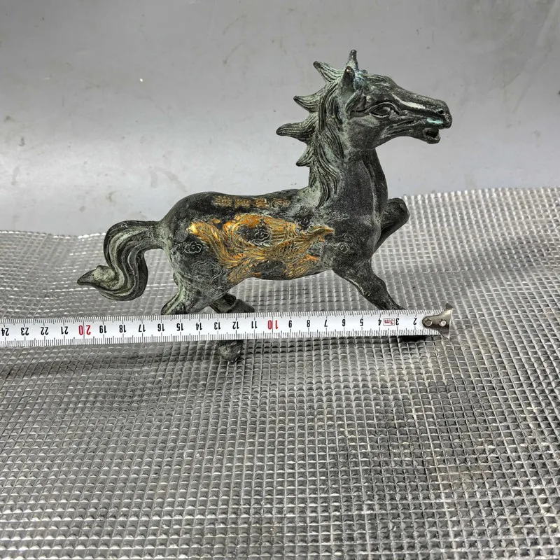 figurine, a decorative piece for the home, a bronze artifact depicting a horse treading on a flying swallow, a gift