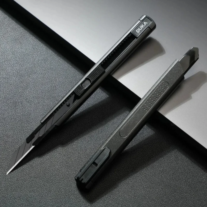 Xiaomi DUKA سكّين متعدّد الاستخدامات صندوق القاطع قابل للسحب شفرات الكربون الصلب سكين جيب تصميم القفل الذاتي أدوات القطع القرطاسية
