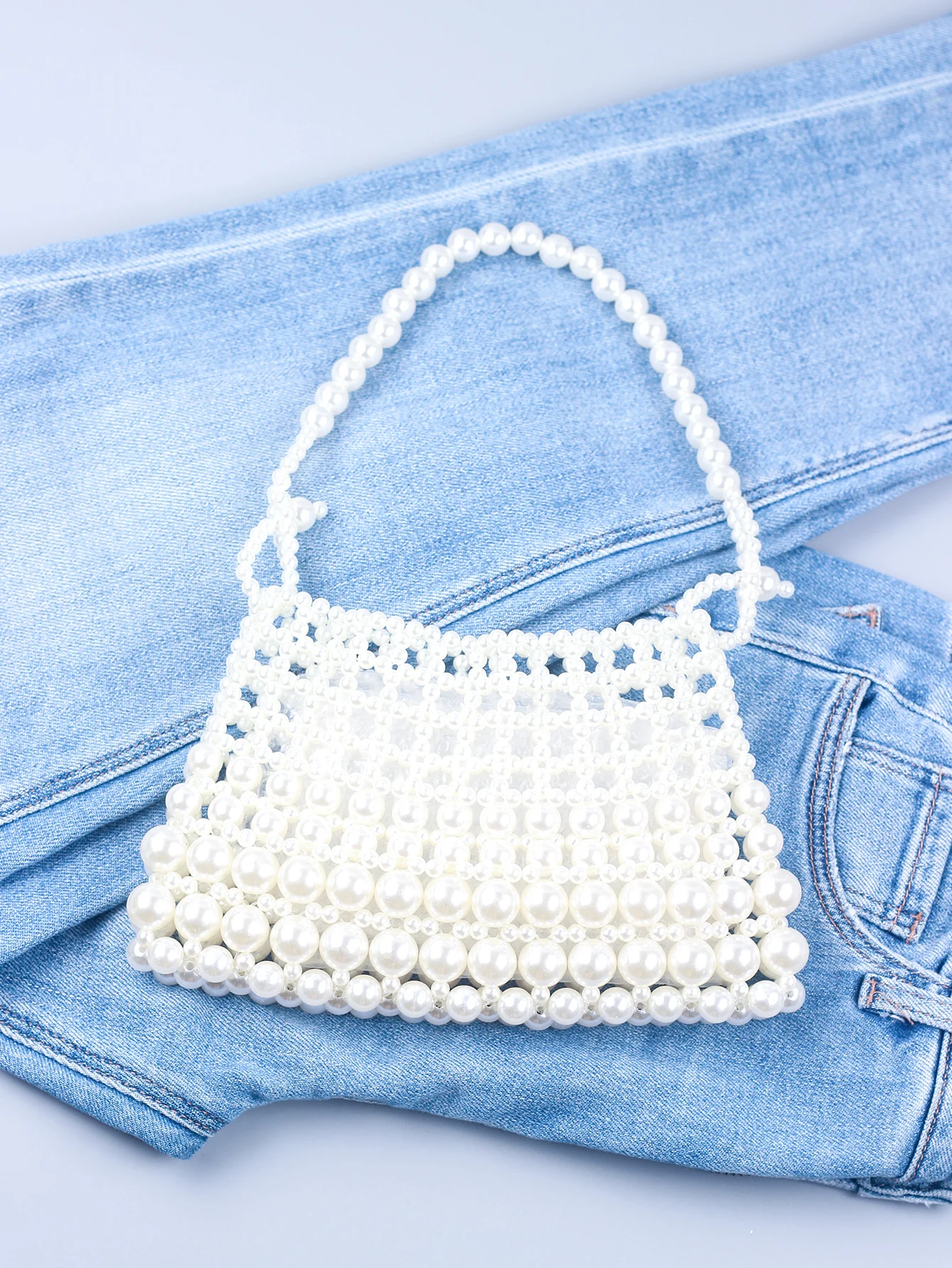 New internet celebrity 2024 Pearl Bag Women\'s Handmade Hollow Beaded Bag French Retro Handheld Women\'s Bag