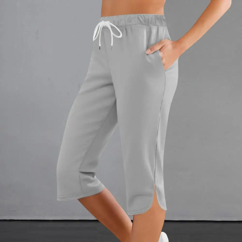 

Однотонные широкие брюки. Стильные женские укороченные брюки с эластичной резинкой на талии и шнурком длиной до середины икры. Сплошной цвет для ношения.