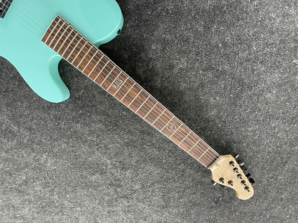 Electric guitar with 7 strings, high quality, seafoam green body, black accessories, can be customized,free shipping