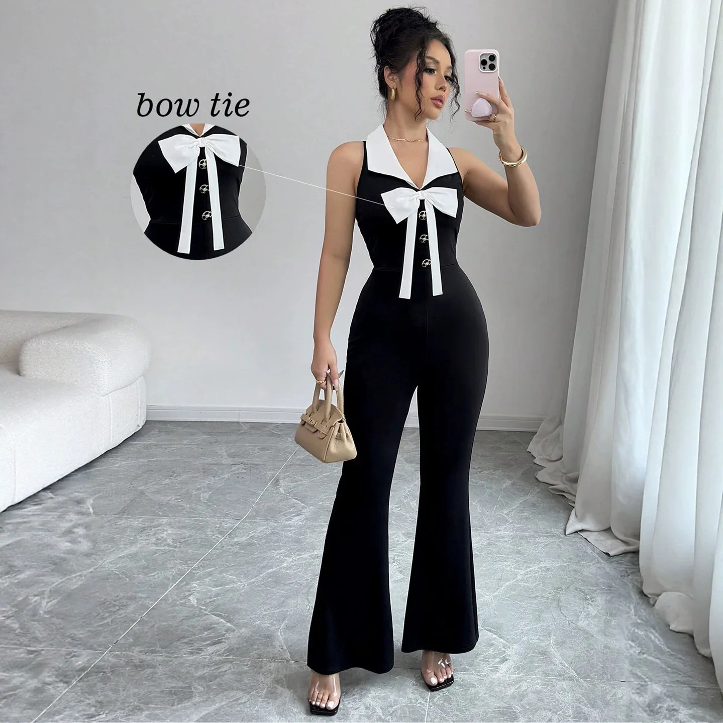 

2026 Summer New Black And White Contrast Bow Jumpsuit With Waist-cinching Sleeveless Bell-bottom Pants Set Elegant Lace Bandage
