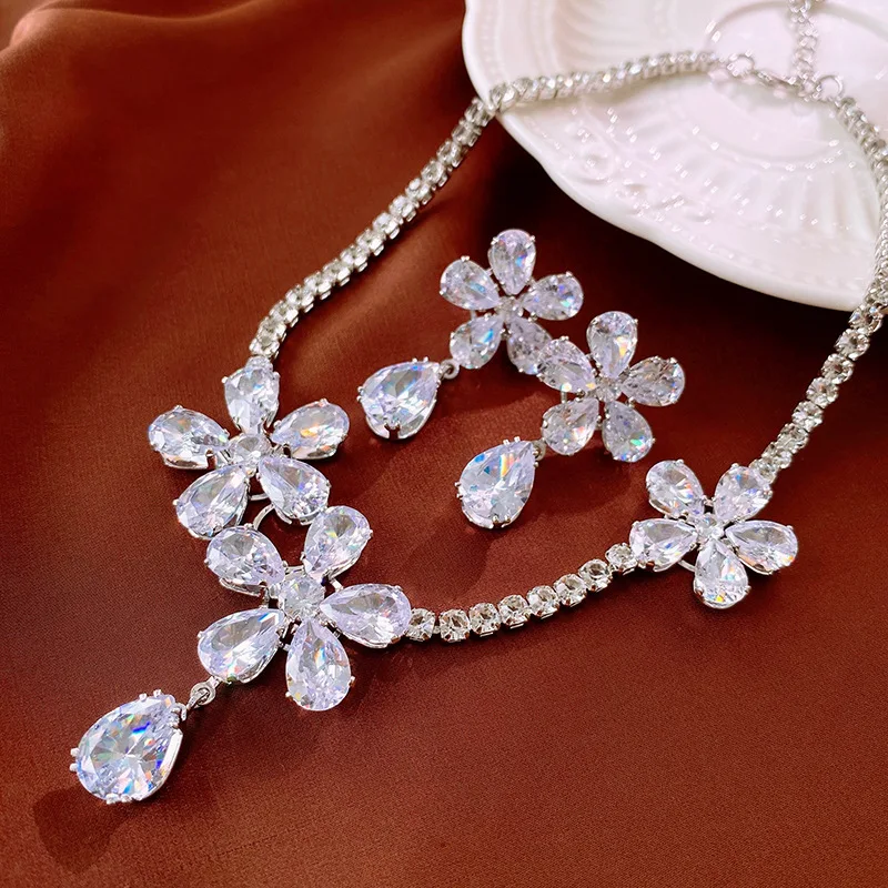 Light luxury zircon flower water drop silver needle earrings personality super flash niche temperament versatile high-end women