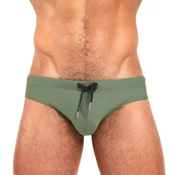 Calzoncillos de baño para hombre, pantalones cortos de playa, Bermudas de baño de cintura baja, tabla de Surf Sexy, traje de baño de Color sólido, trajes de baño acolchados con realce