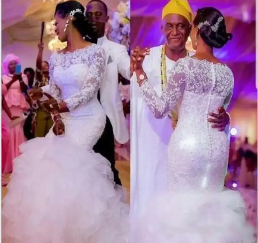 

Customized Sexy African White Lace Mermaid Tiered Skirt Sweep Train Bridal Gowns Plus Size Long Sleeve Wedding Dress