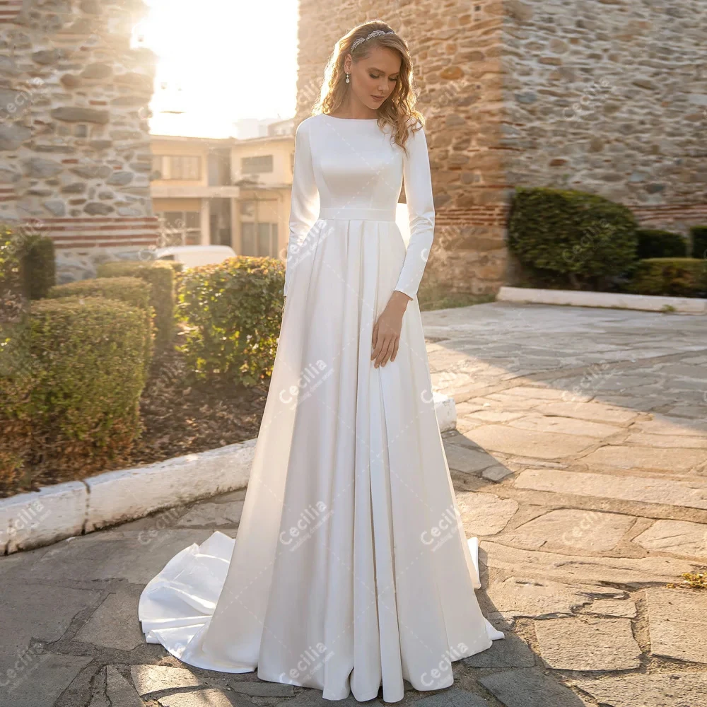 Abiti da sposa modesti Abiti da sposa in raso Maniche lunghe Abiti O-Collo Sweep Train Robes Graceful Vestidos De Novia Personalizzato 2025