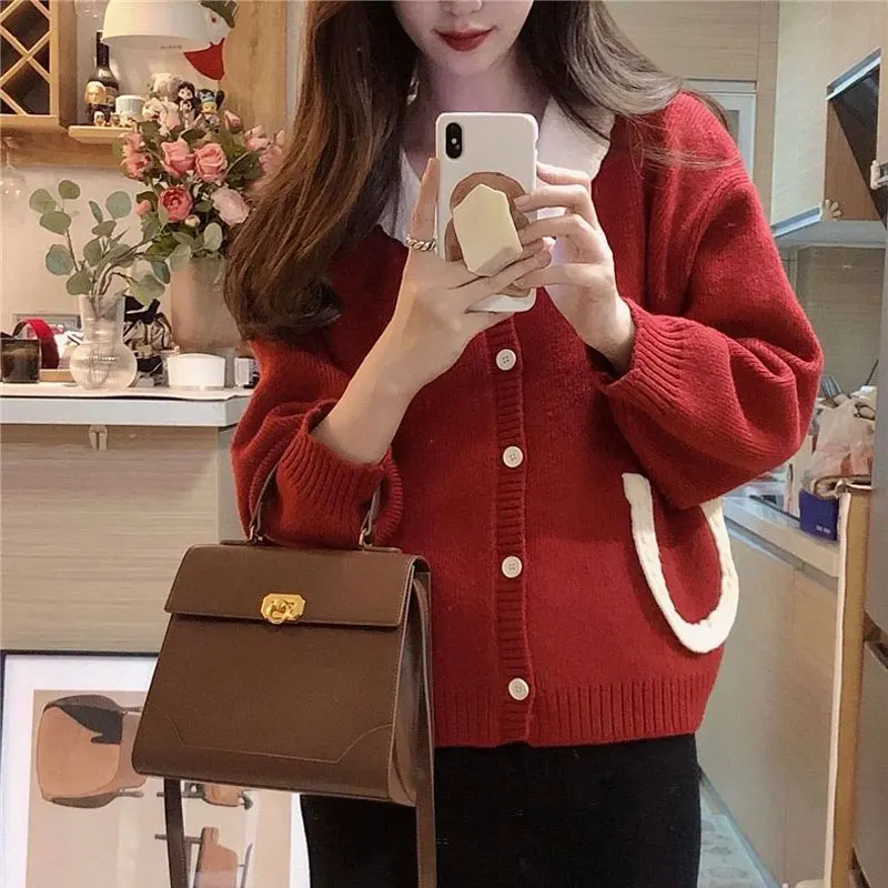 Herbst Winter Vintage rote Pullover lose V-Ausschnitt Damen bekleidung Taschen gespleißt sanfte koreanische einreihige Strickjacke