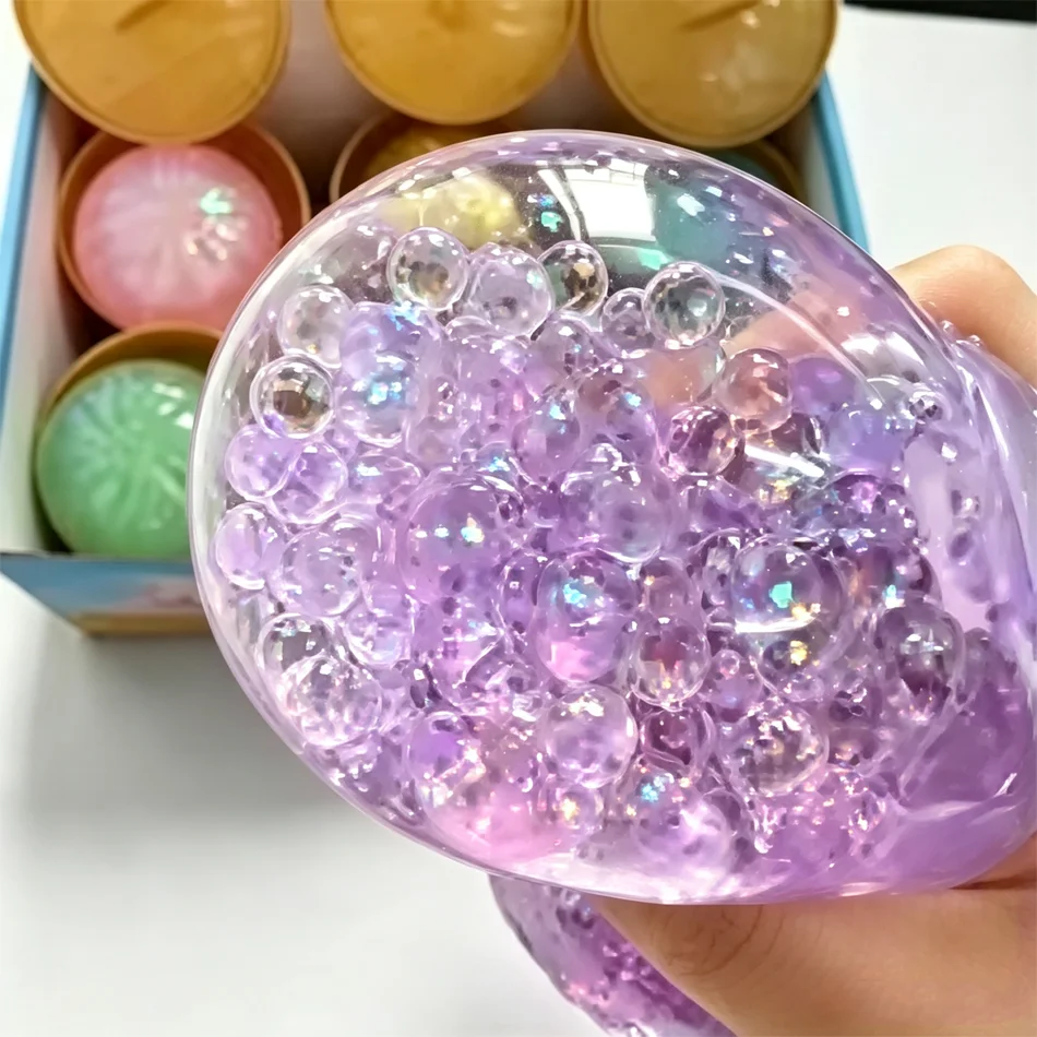 لعبة سكويشي لامعة على شكل زلاب - مراجعة Kids Toys Dumplings وسعره