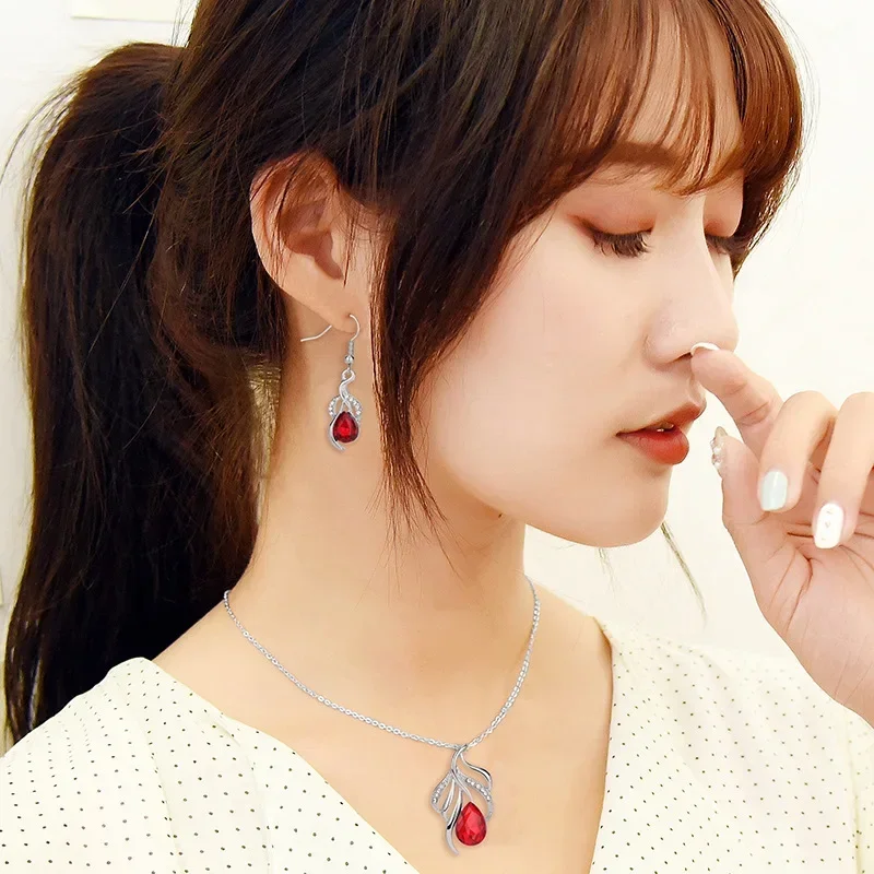 Fashionable crystal water drop necklaces, stud earrings and ladies' suits