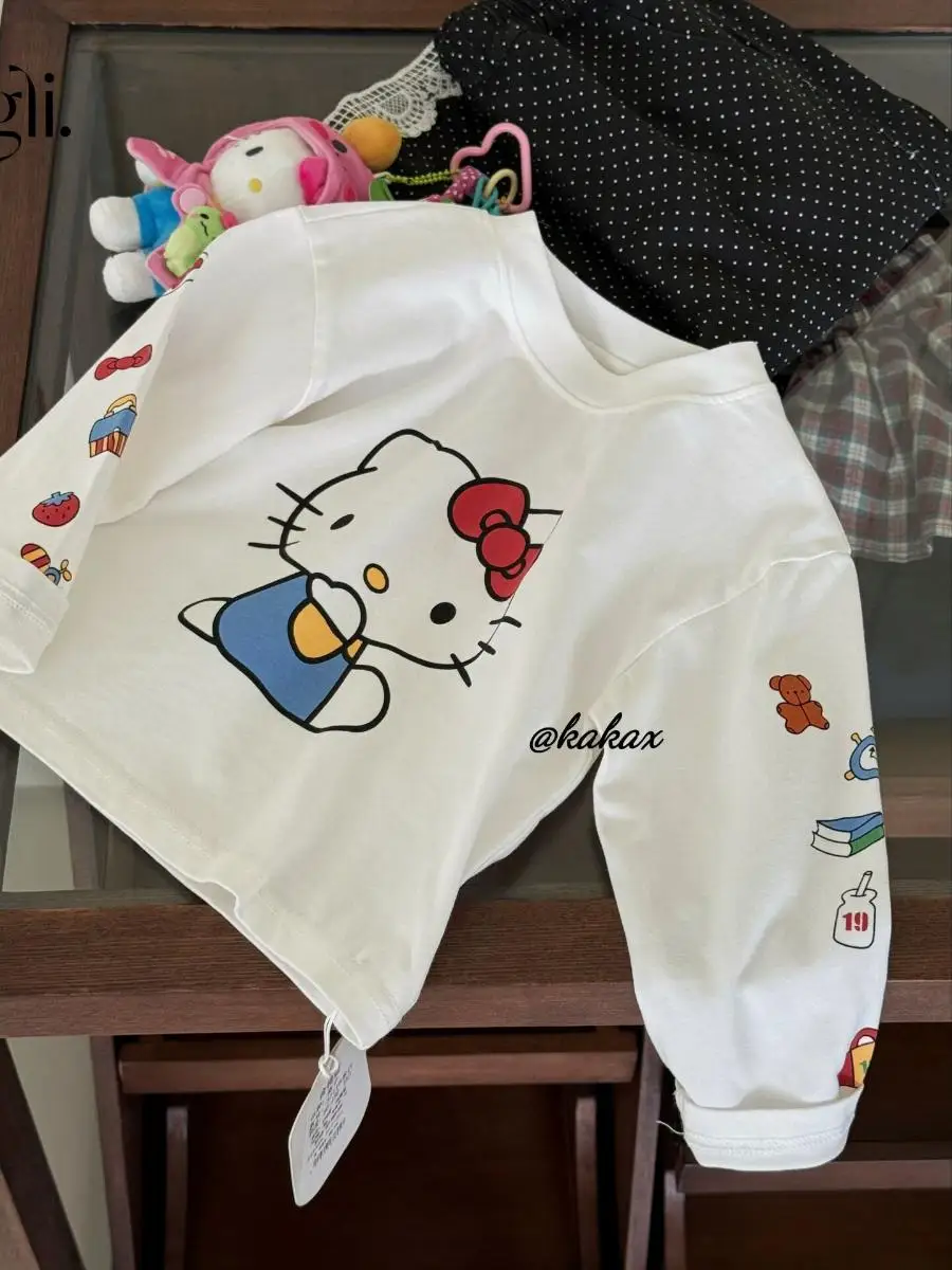 Urocza dziewczęca bawełniana koszulka z długim rękawem, nadruk KT, warstwa bazowa, modna odzież jesienna, ubrania dla dzieci, dopasowany krój.