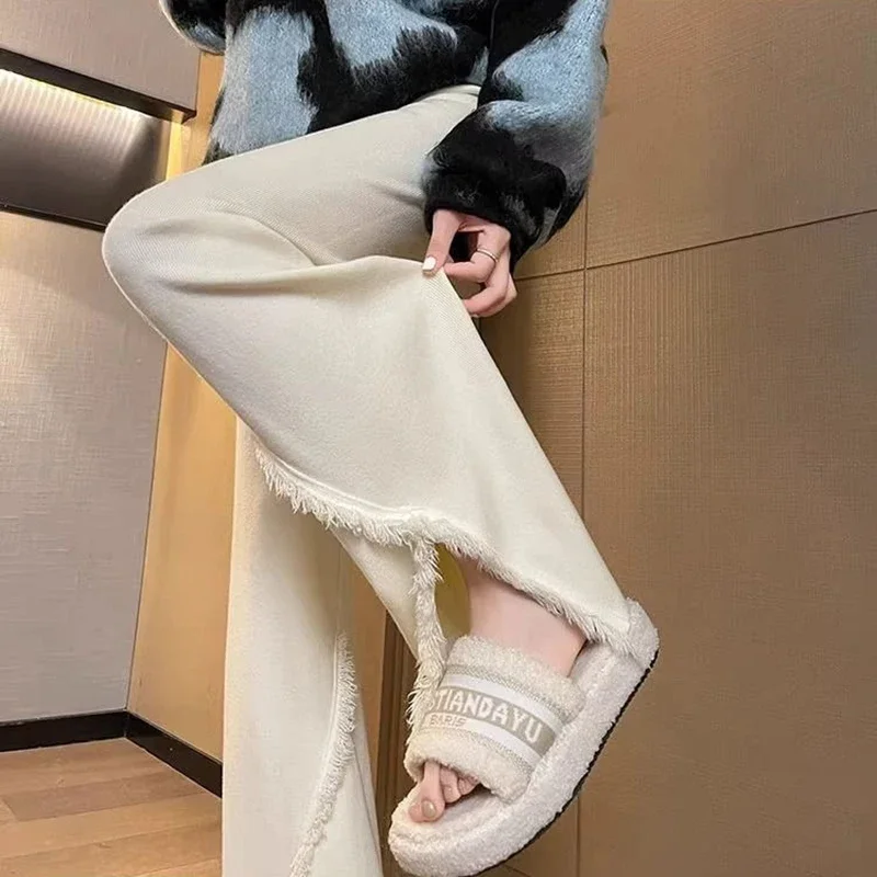 سراويل سميكة متماسكة للنساء للخريف والشتاء سراويل أرز لزجة ناعمة بشرابة عالية الخصر سراويل مدببة للتنحيف