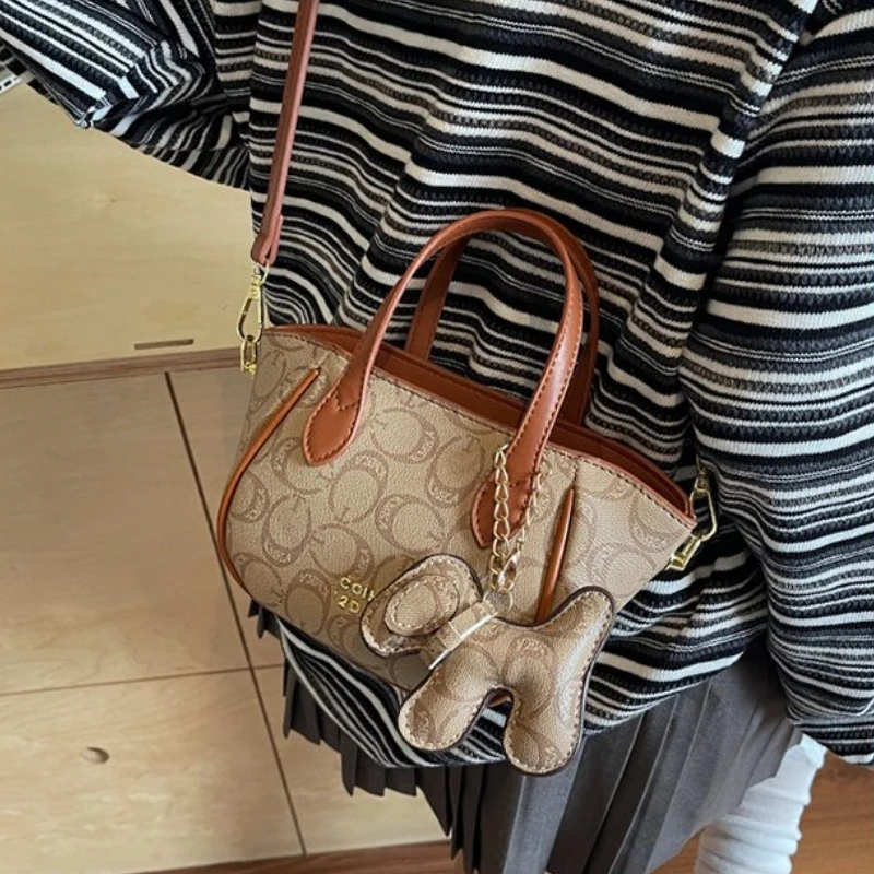 

Embroidered Denim Crossbody Bag: Casual Chic Female Bag, Artistic Stitching & Distressed Details for Everyday Fashion