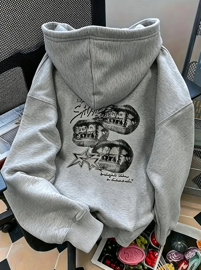 A loose-fitting hooded sweatshirt with a fashionable retro lipbaring letter pattern print suitable for spring and autumn seasons