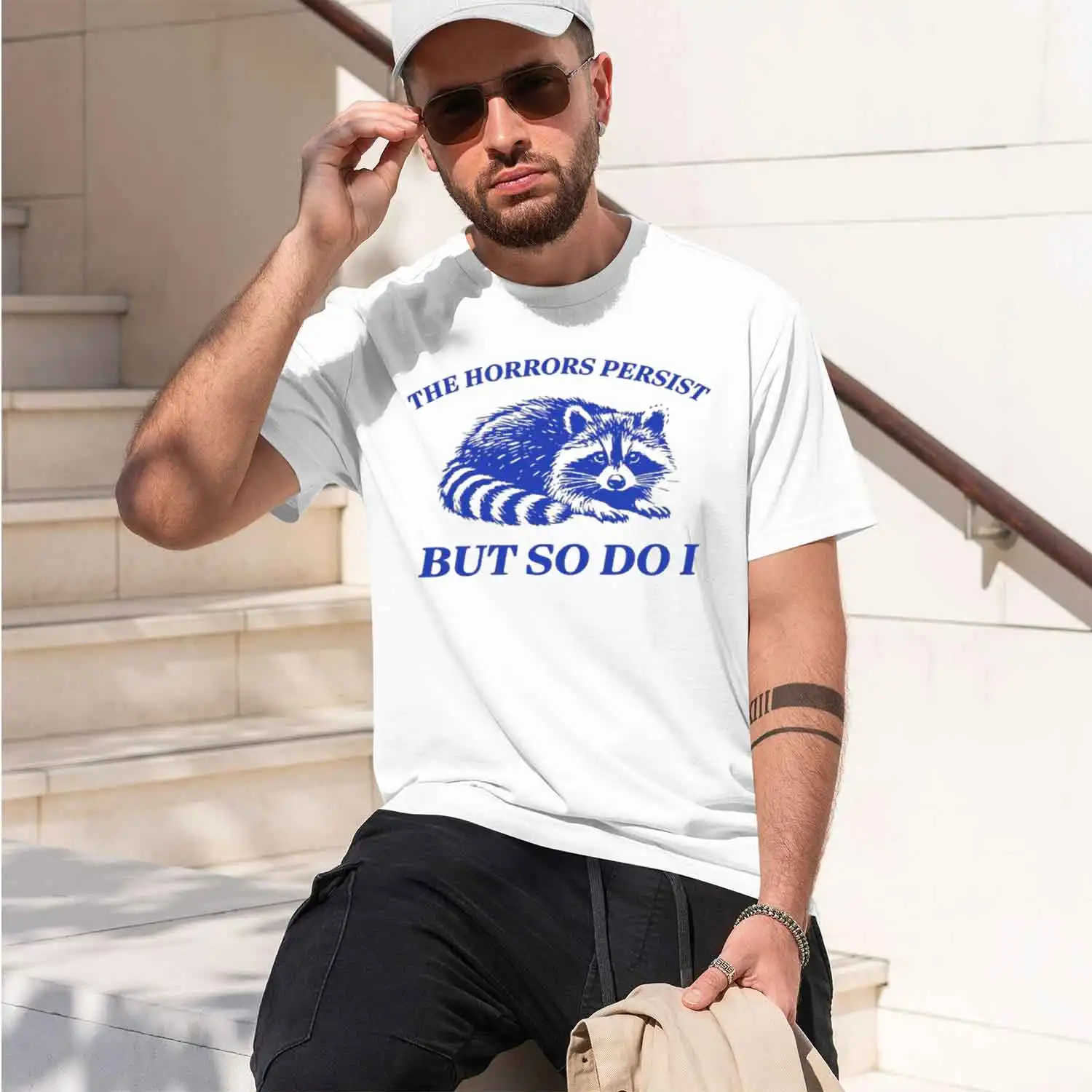 The Horrors Persist But So I T-Shirt Men Women Funny Raccoon T Shirt Vintage Y2K Animal Humor Tshirt Short Sve Tee 2026 New Mode
