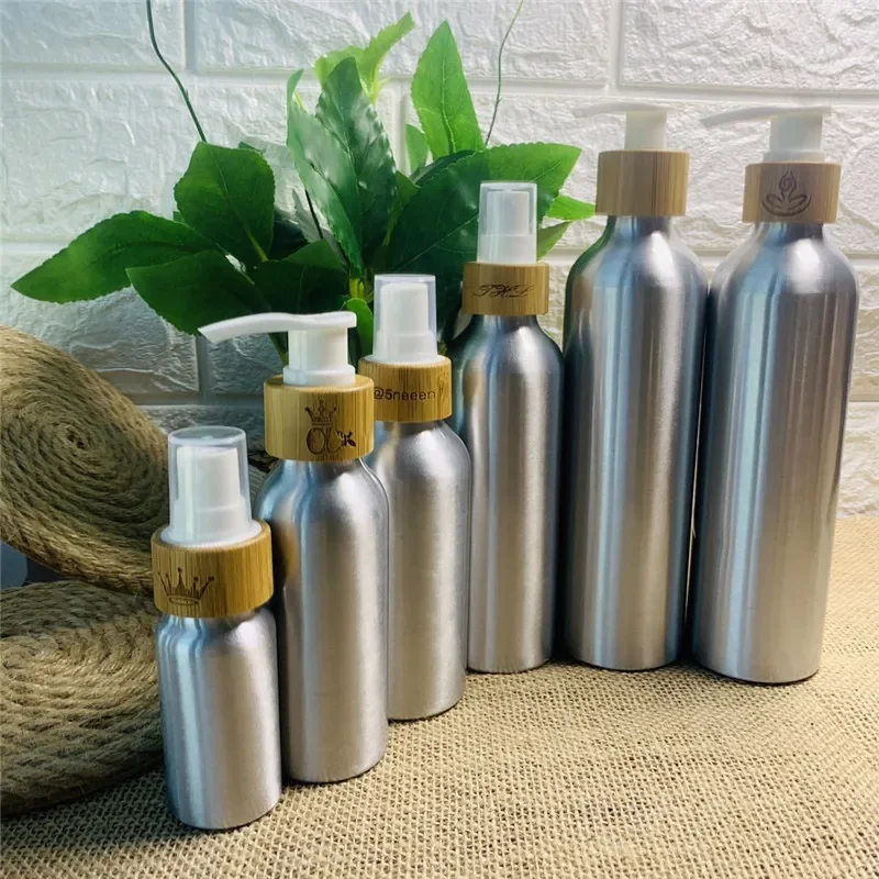 Botella de aluminio con logotipo personalizado a la moda con tapa de bomba de loción en aerosol de bambú, botella de spray para el cabello, envases de loción para embalaje de cosméticos