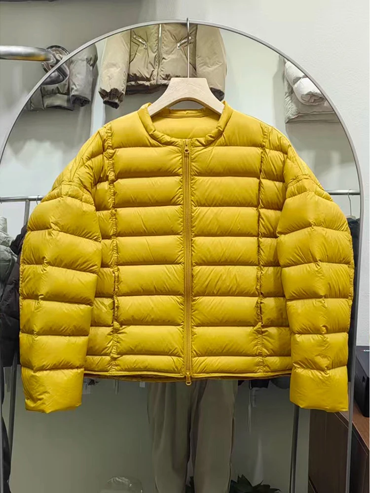 

2025 new lightweight down jacket women's Korean version short round neck fashionable pork ribs 90 white duck down warm coat