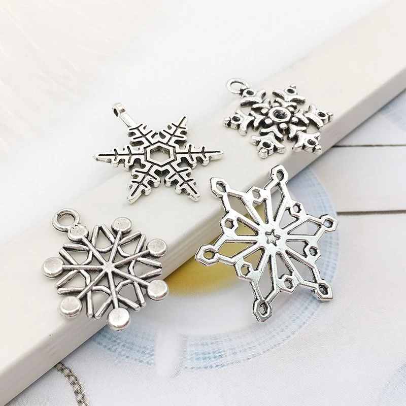 (14Pcs/pack)1cm-2.5cm Mixed Silver Alloy Snowflake Pendant Christmas Decoration Metal Hollowed Out Snowflake Handmade Gift Label