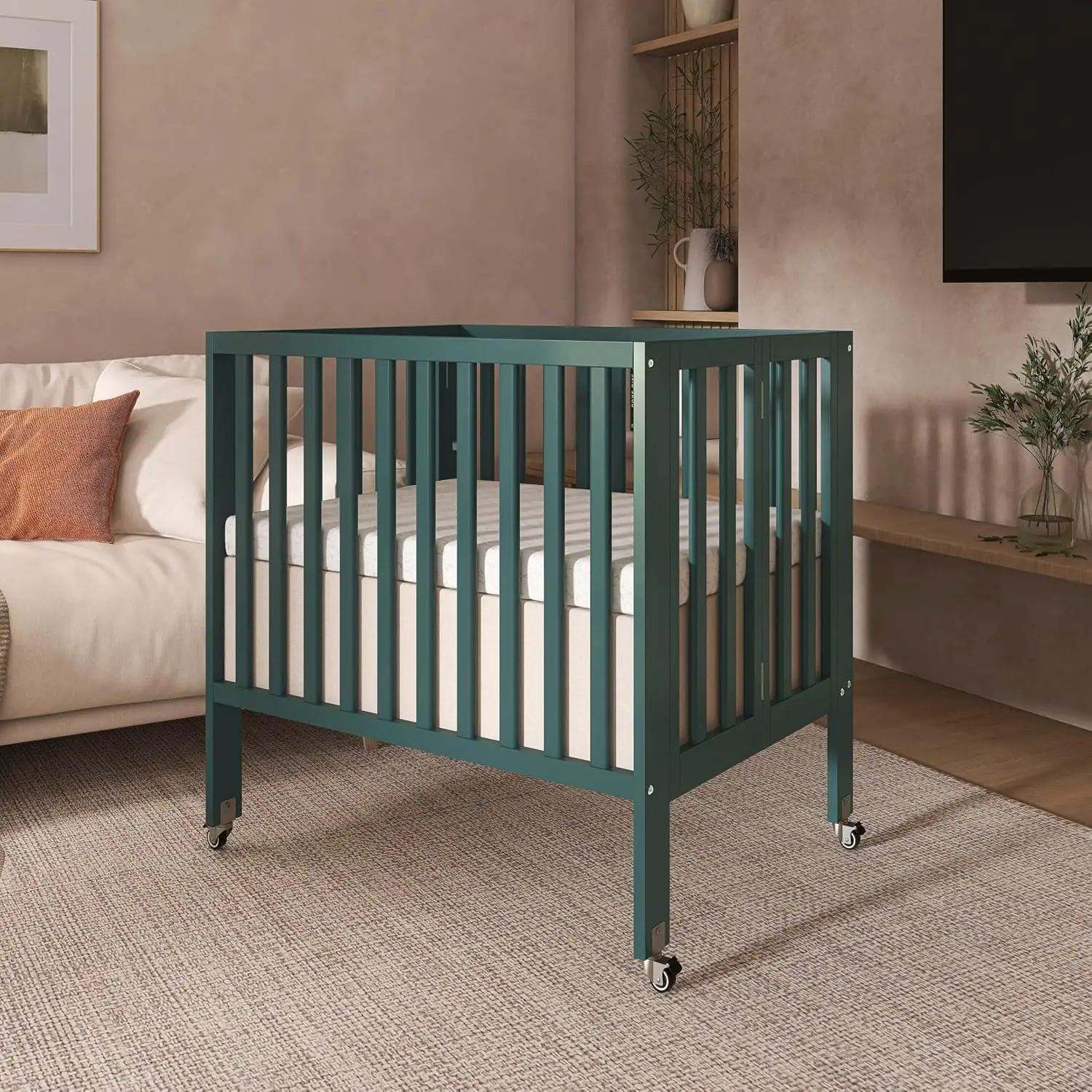 Portable Mini Crib with Flat Folding System, Lightweight for Travel, Adjustable Heights & Safe Wheels