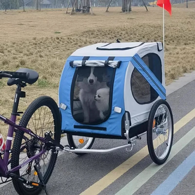Compact, foldable outdoor camping bicycle trailer – a rear-hitched small hitch-on cart with a cargo bin, for carrying pets and